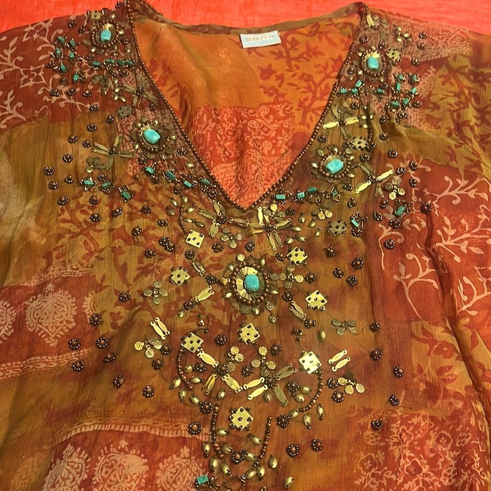 Beautiful sheer tunic with turquoise stones and multi beads.